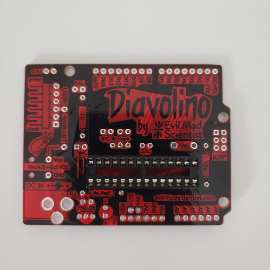 Soldering the socket for the Arduino microcontroller.